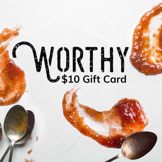 spoons covered in jam and jam smears all around the spoons with writting in the center of the image that reads "Worthy 10 dollar gift card".