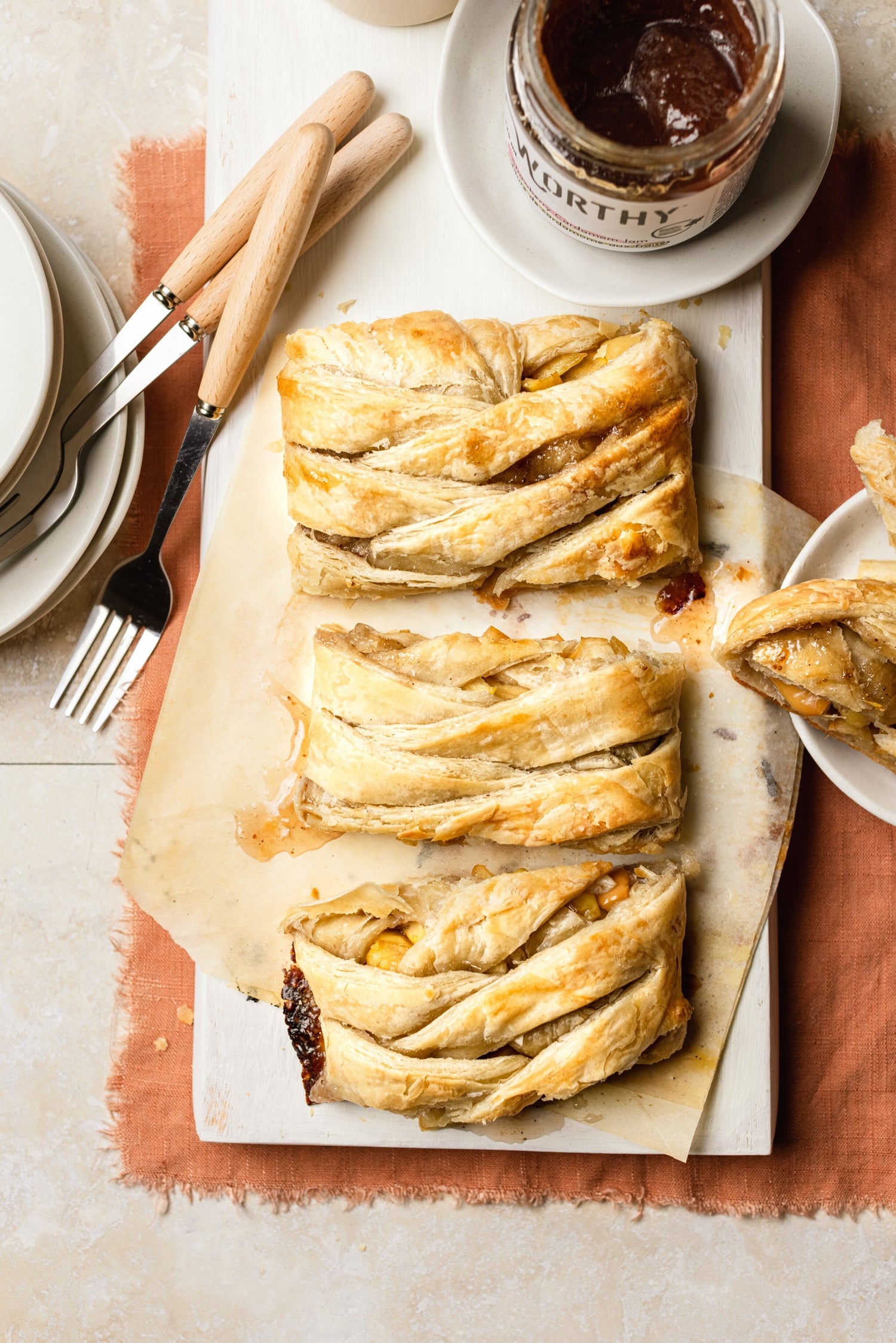 Sliced apple strudel and a strawberry-cardamom filling made with Worthy's Strawberry Cardamom jam.