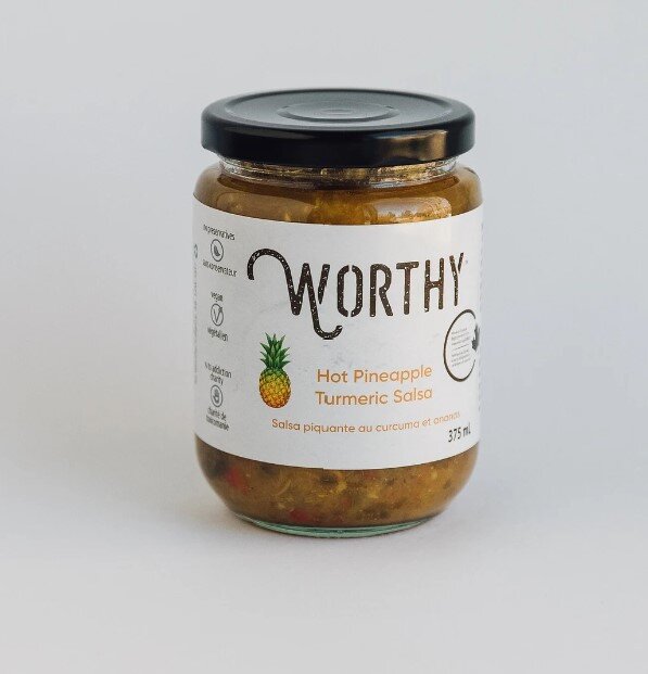 Worthy's Hot Pineapple Turmeric Salsa against a white background.